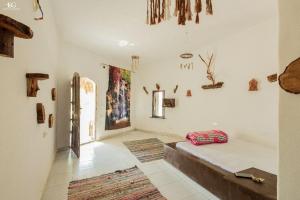 Postel nebo postele na pokoji v ubytování Palm Valley camp