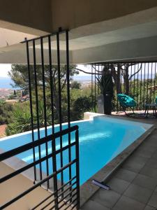 a swimming pool in a villa with a view at Villa Bellevue in Sète