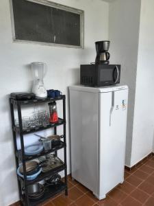 Η κουζίνα ή μικρή κουζίνα στο Apt Centro Comercial Vilage 1