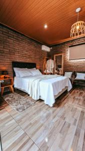 Χώρος καθιστικού στο Chalés Manacá dos Canyons