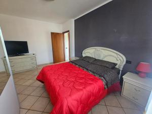 Ένα ή περισσότερα κρεβάτια σε δωμάτιο στο La Villetta Gialla