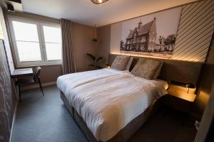 Postel nebo postele na pokoji v ubytování Boutique Hotel de Zeuve Meeren