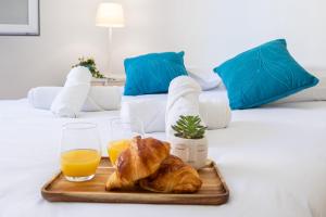 Ένα ή περισσότερα κρεβάτια σε δωμάτιο στο Néolia - Climatisé - Parking - Aix-Le Tholonet