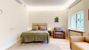 Ένα ή περισσότερα κρεβάτια σε δωμάτιο στο tARTu Stays at City Center