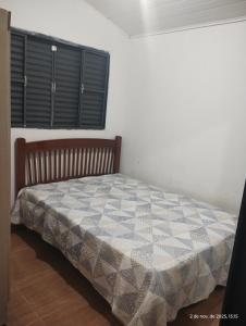 En eller flere senge i et værelse på casa climatizada lateral da br