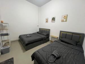 Postel nebo postele na pokoji v ubytování Molly Home มอลลี่โฮม