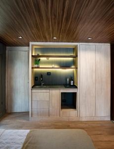 Postel nebo postele na pokoji v ubytování Lun Lodges