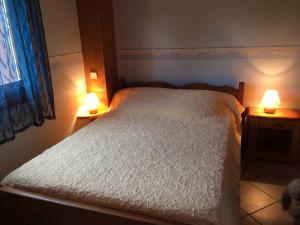 Postel nebo postele na pokoji v ubytování Gîte L'Erablière