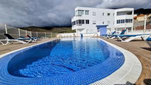 a swimming pool on the deck of a cruise ship at Skyview Apartment in Adeje