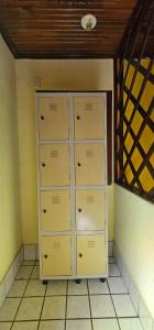 a room with a closet with filing cabinets in it at Hostel Beach in Porto Seguro