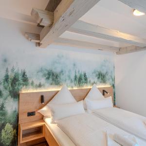 Ένα ή περισσότερα κρεβάτια σε δωμάτιο στο Schwarzwaldmarie Bernau