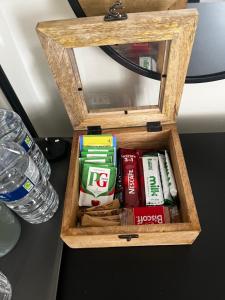 a wooden box with drinks in it on a table at The Boutique Bungalow in Bundoran