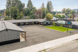 an empty parking lot in front of a building at The Flats- Studio #6- Modern Downtown Stay in Coeur d'Alene