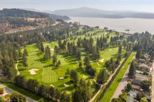 an aerial view of a golf course on a hill at The Flats- Studio #6- Modern Downtown Stay in Coeur d'Alene