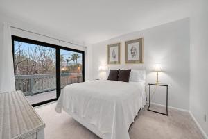 Ένα ή περισσότερα κρεβάτια σε δωμάτιο στο Heron House