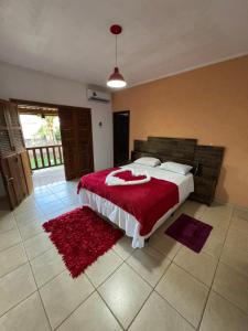 Postel nebo postele na pokoji v ubytování Pousada Recanto Guará