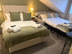 Postel nebo postele na pokoji v ubytování The Boutique Bungalow