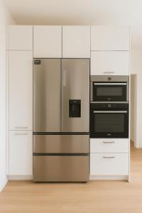 Kuchyň nebo kuchyňský kout v ubytování Spacious 2BR Retreat for Families & Friends near City Center