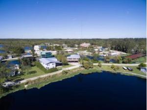 an aerial view of a house next to a lake at Peace on the River, Breathtaking Views in Cocoa