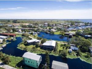 an aerial view of a town with a river at Peace on the River, Breathtaking Views in Cocoa
