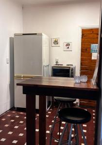 Kuchyň nebo kuchyňský kout v ubytování Espacio mas elegido acepta mascotas-Pileta con parrilla Wifi Ropa cama reposeras