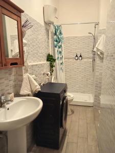 Koupelna v ubytování Stanza singola sul mare