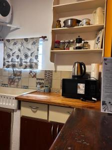 Kuchyň nebo kuchyňský kout v ubytování Espacio mas elegido acepta mascotas-Pileta con parrilla Wifi Ropa cama reposeras