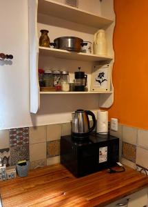 Kuchyň nebo kuchyňský kout v ubytování Espacio mas elegido acepta mascotas-Pileta con parrilla Wifi Ropa cama reposeras + 10 fotografií