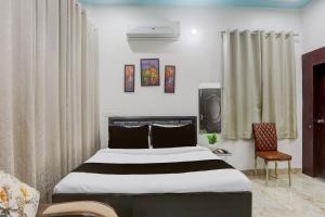 Ένα ή περισσότερα κρεβάτια σε δωμάτιο στο Hotel O Keptown