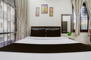 Ένα ή περισσότερα κρεβάτια σε δωμάτιο στο Hotel O Keptown