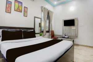 Μια τηλεόραση ή/και κέντρο ψυχαγωγίας στο Hotel O Keptown +23 φωτογραφίες