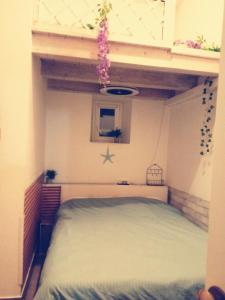 Postel nebo postele na pokoji v ubytování Stanza singola sul mare