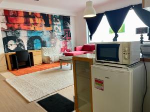 Kuchyň nebo kuchyňský kout v ubytování Green River Loft