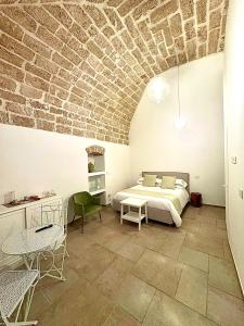 Ένα ή περισσότερα κρεβάτια σε δωμάτιο στο SuiteLab