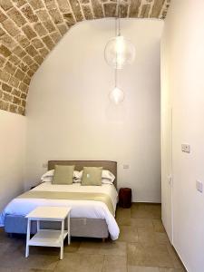 Ένα ή περισσότερα κρεβάτια σε δωμάτιο στο SuiteLab