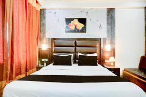 Ένα ή περισσότερα κρεβάτια σε δωμάτιο στο Dee Intercontinental +22 φωτογραφίες