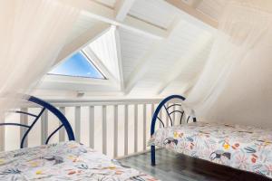 Ένα ή περισσότερα κρεβάτια σε δωμάτιο στο Appartement Coconut