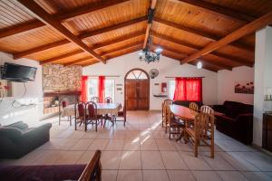 TV a/nebo společenská místnost v ubytování Casa Villa del Lago