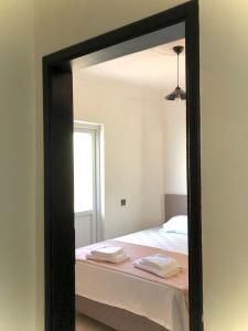 Ένα ή περισσότερα κρεβάτια σε δωμάτιο στο Deka apartments 5