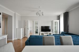 Μια τηλεόραση ή/και κέντρο ψυχαγωγίας στο Pure Paradise - Luxury 4-Room Apartment in Riga