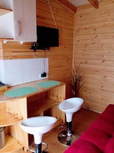 TV a/nebo společenská místnost v ubytování Eco Cabañas Wanderlust