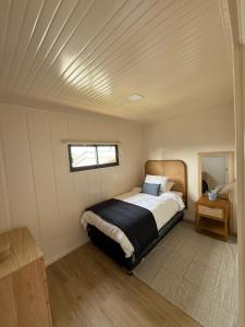 Ένα ή περισσότερα κρεβάτια σε δωμάτιο στο LITUECHE Casa Marea