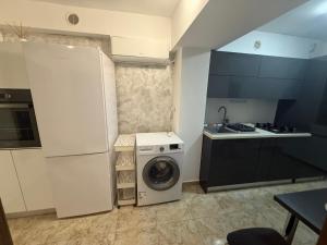 Η κουζίνα ή μικρή κουζίνα στο Cozy apartment