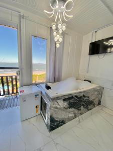 TV a/nebo společenská místnost v ubytování Pousada São Miguel Beach Beira Mar