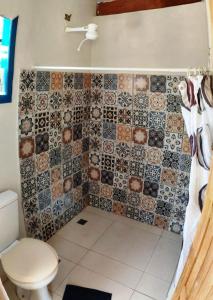 Phòng tắm tại Chalé aconchegante com cachoeiras privadas