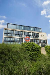 a building with a sign in front of it at citizenM Tower of London in London