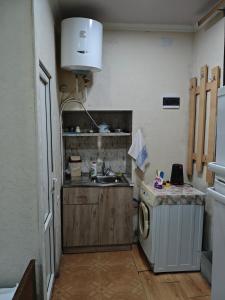 Kuchyň nebo kuchyňský kout v ubytování Vardan's Guest House