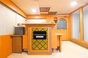 a front door of a room with a townhouse entrance at Townhouse Hill Cart Road Siliguri in Siliguri