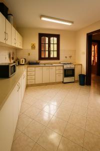 Kuchyň nebo kuchyňský kout v ubytování Posada Madre America