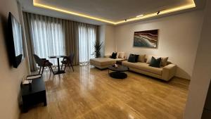 Χώρος καθιστικού στο Prestige Aman